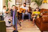 Family Fun with Elvis: Colt Clark and the Quarantine Kids Jam to 'Suspicious Minds'