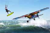 World’s First: Kitesurfer Jumps Over a Flying Plane